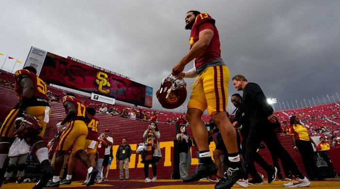 USC quarterback Caleb Williams (13) makes his way off the field after warmup up before a game against UCLA.
